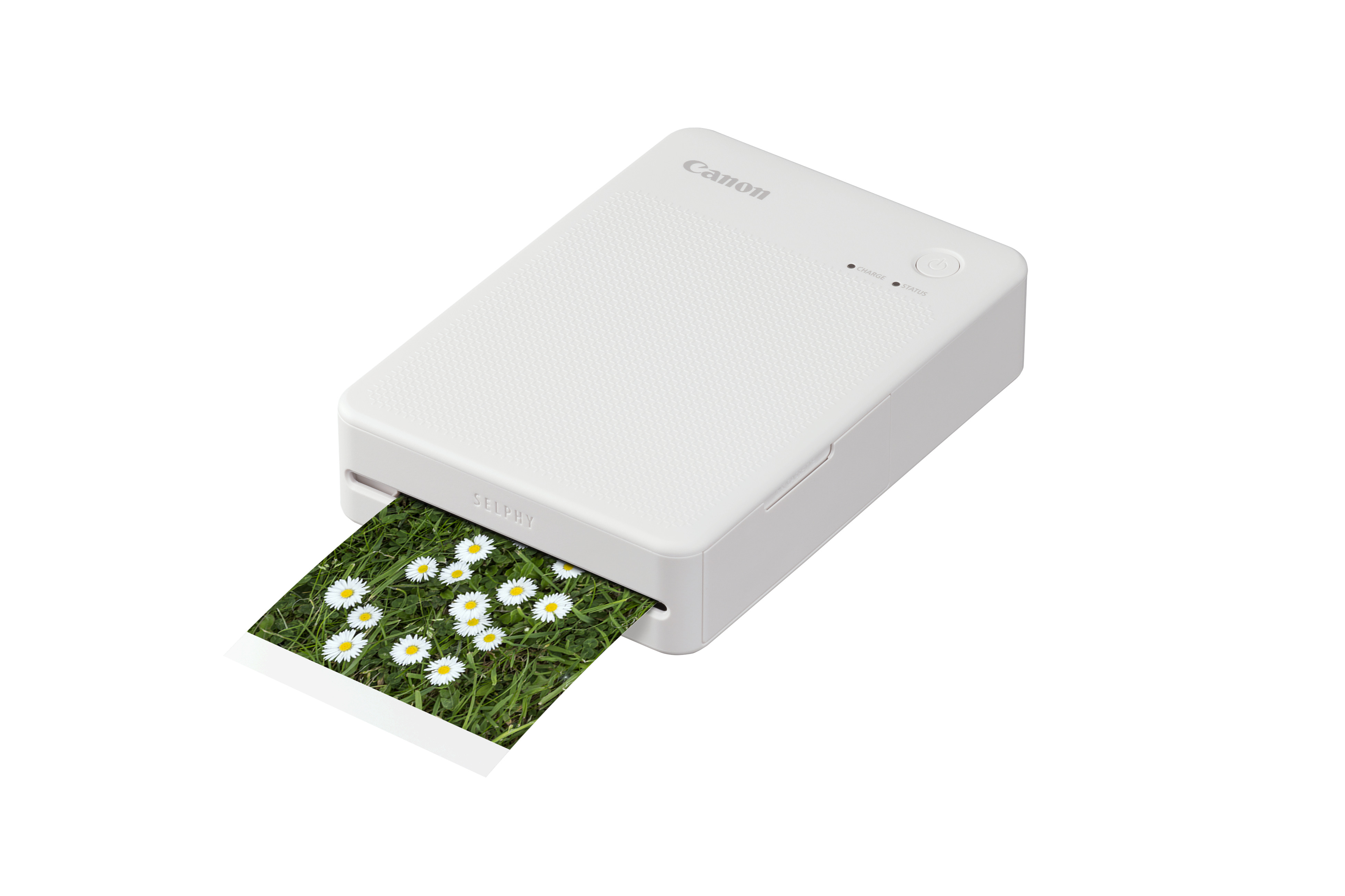 SELPHY QX20 Fotodrucker (weiß) Canon Selphy X20 Mobiler Fotodrucker in der Farbe Weiß, Schräg liegend mit halbausgedrucktem Foto