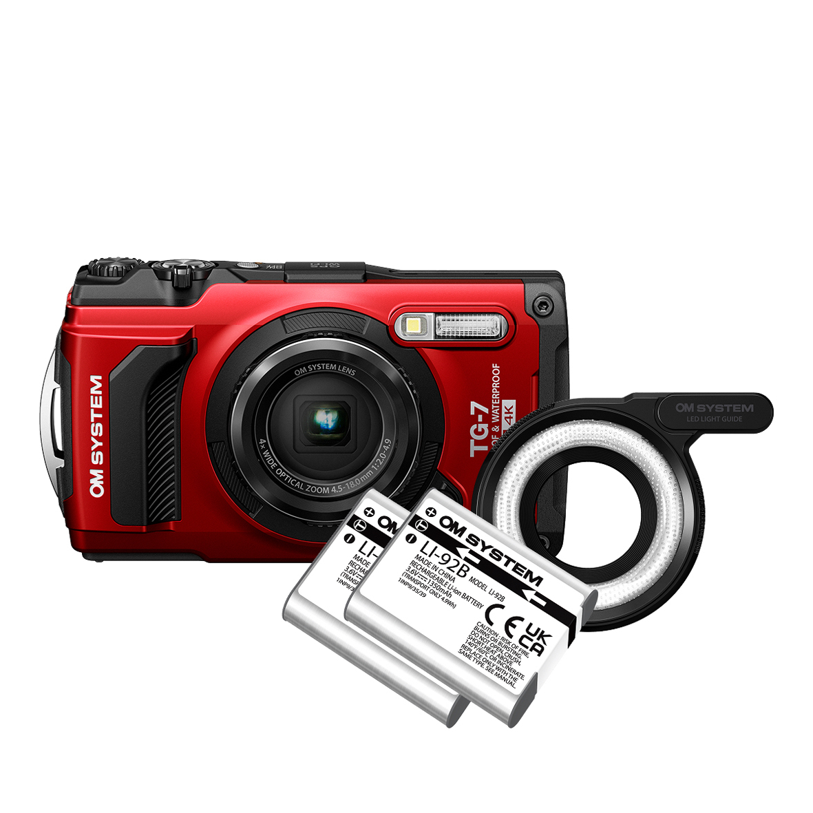 OM SYSTEM TG-7 Adventure Kit mit Kamera, LED-Lichtring und zwei Akkus in der Vorderansicht.