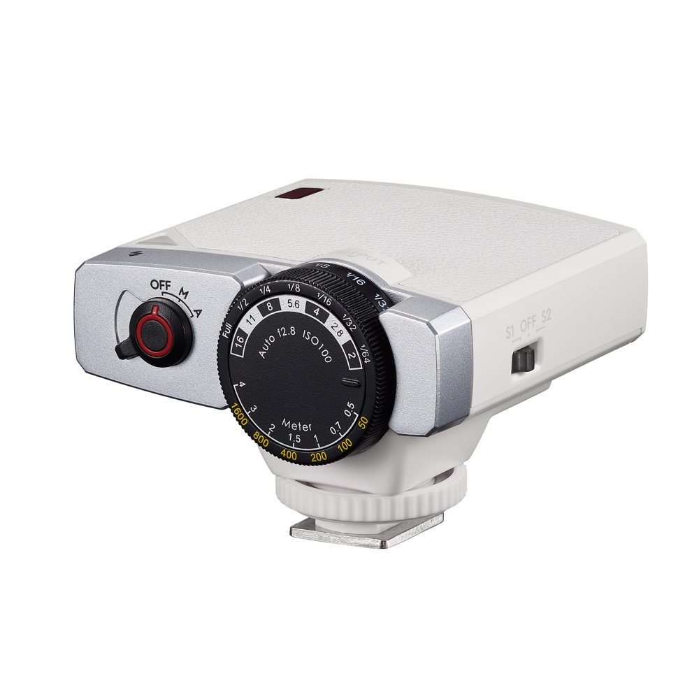 Godox Lux Junior Blitzgerät in Grau – schräge Rückansicht mit Einstellrad für ISO, Blende und Blitzleistung