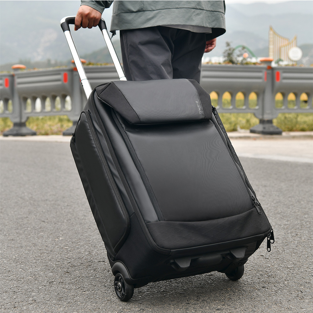 Eirmai Falcon Serie FT10 44L Kamera-Trolley in Schwarz, Nutzung als Rollkoffer mit ausgezogenem Teleskopgriff