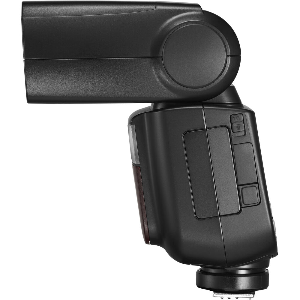 Godox V860III Speedlite für OM SYSTEM und Panasonic in Seitenansicht mit dreh- und schwenkbarem Blitzkopf.