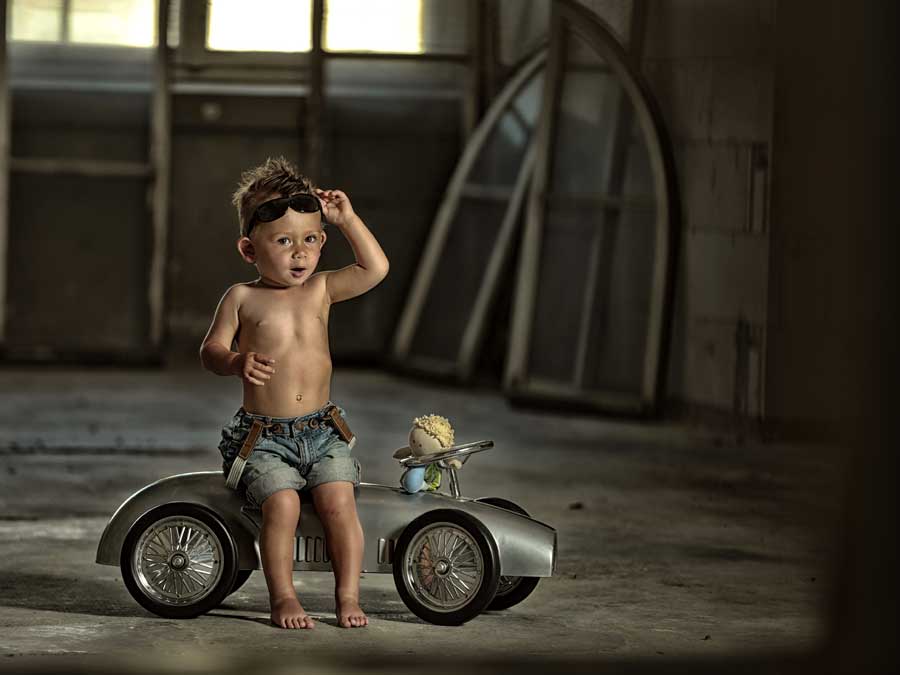 Tecco SP130 Produktfoto, Kind mit Spielzeugauto