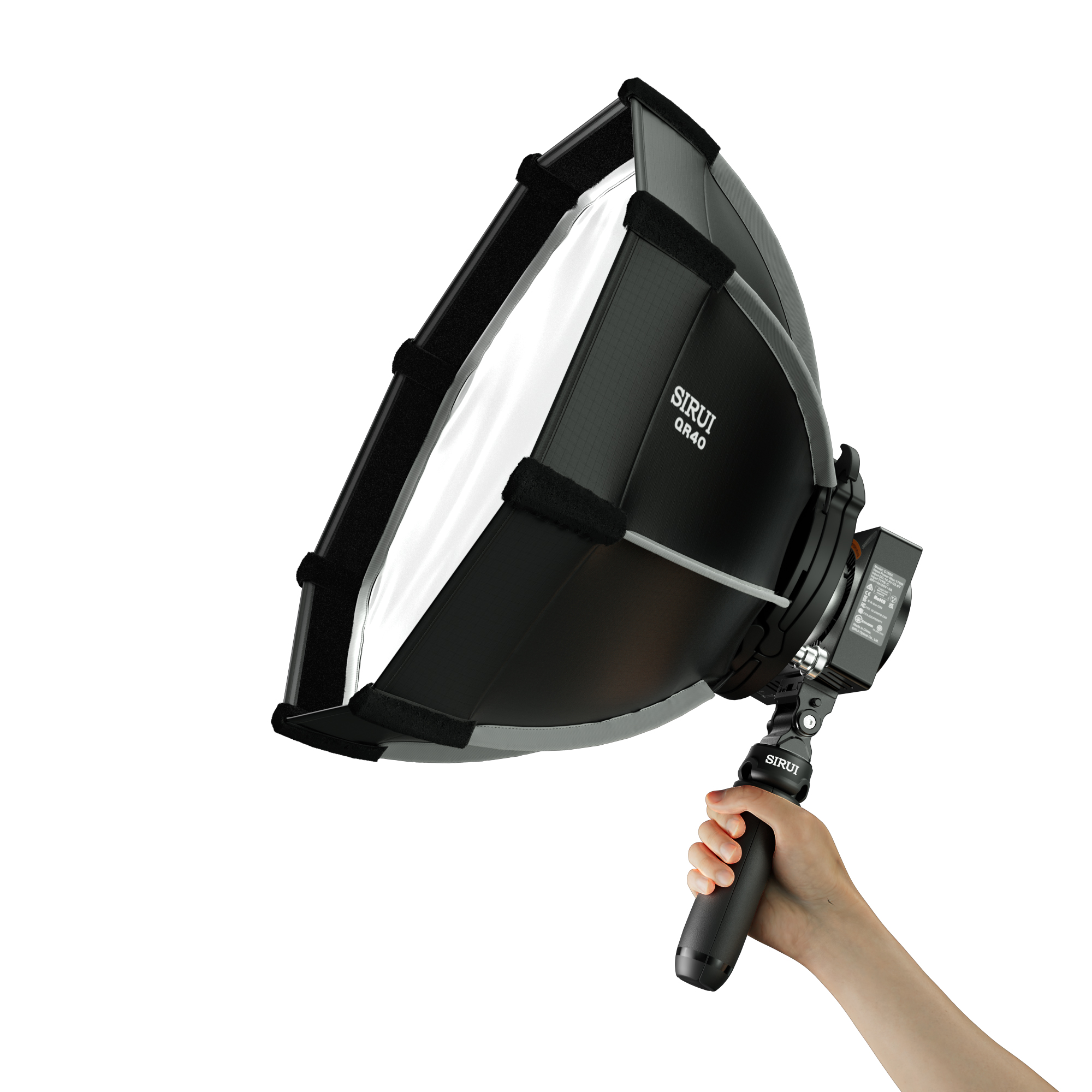 C150X Combo Mini Flächenleuchte, gehalten an Stativ von einer Hand