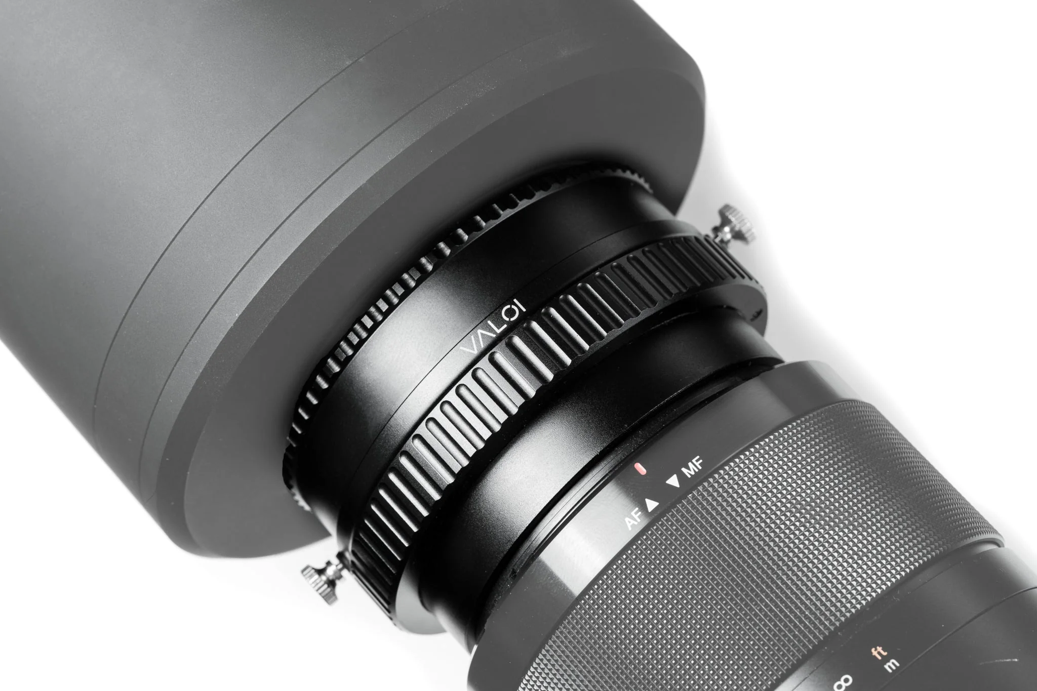 VALOI Precision Framing Helicoid montiert zwischen Objektiv und easy35 bzw. easy120 zur präzisen Bildeinstellung.